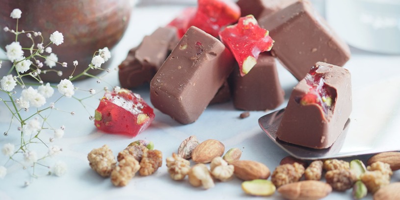 Eat chocolate covered seeds to treat magnesium deficiency, muscle aches, and boost energy.